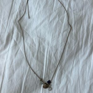 Sterling silver necklace with several charms